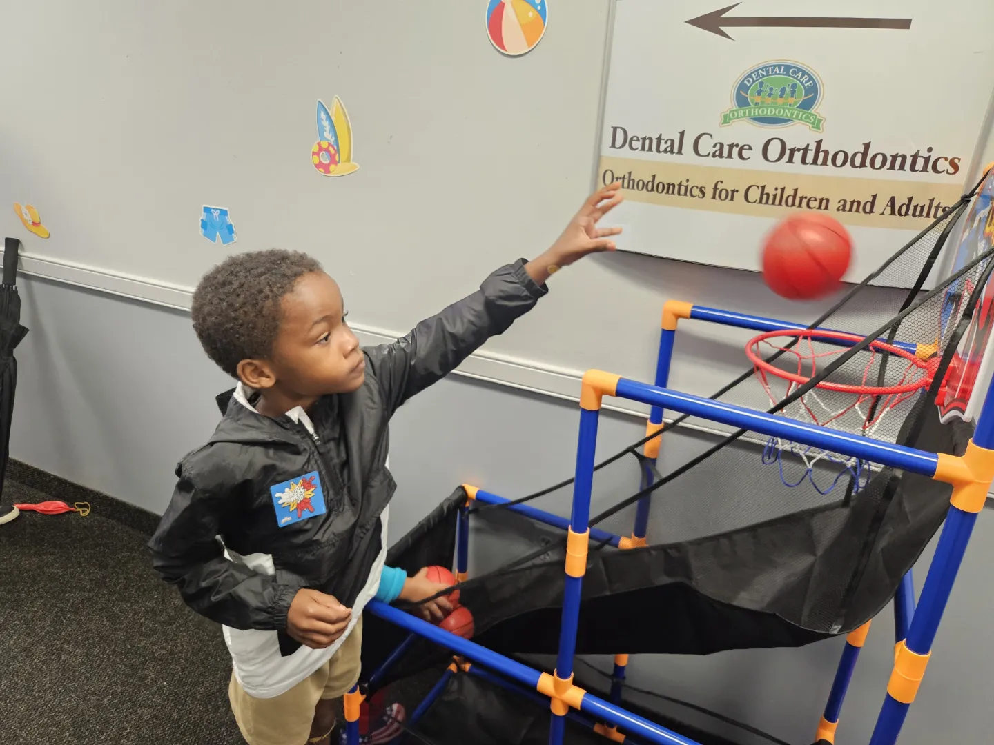 A Dental Care Kids patient at the play structure next door