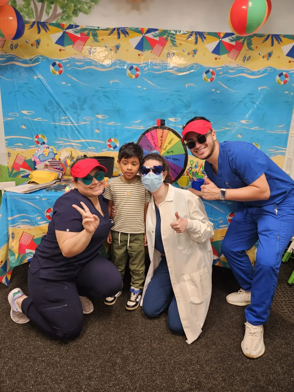 Dental Care Kids team receiving local awards at community event