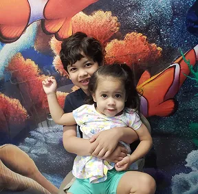 A Dental Care Kids hygiene room with hand-painted murals